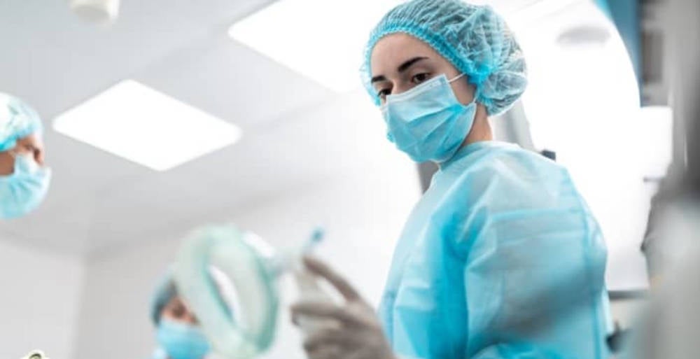 a surgical nurse in an operating theatre 