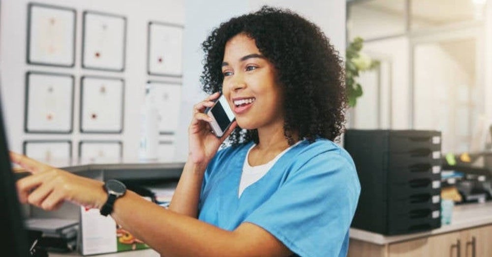 a telehealth nurse giving a consultation over the phone