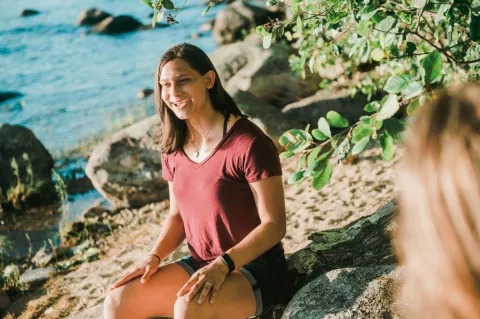 nursing graduate on a beach